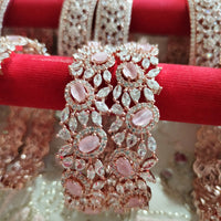 B0213_S_Elegant flowery design Bangles studded with American Diamond stones with a touch of pink stones with delicate stone work.