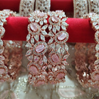 B0213_S_Elegant flowery design Bangles studded with American Diamond stones with a touch of pink stones with delicate stone work.