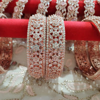 B0239_S_Ravishing Broad Rose gold bangle with delicate flower design embellished with American Diamond stones.