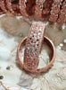 B0239_S_Ravishing Broad Rose gold bangle with delicate flower design embellished with American Diamond stones.