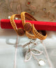 B069_Gorgeous Gold plated bangles studded with pink ruby stones.