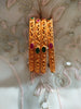 B0239_Gorgeous Gold plated bangles studded with pink & green ruby stones.
