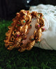 B0253_Gorgeous Ganesha design bangles with delicate work with a touch of green & pink ruby stones.