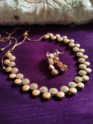 N0374_Stylish rose gold American Diamond stones embellished necklace set.