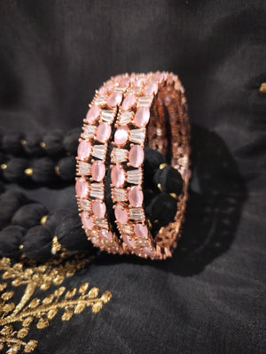 B0261_Elegant Rose Gold bangles embellished with American Diamond stones with a touch of dazzling pink stones.