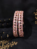 B0261_Elegant Rose Gold bangles embellished with American Diamond stones with a touch of dazzling pink stones.