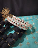 B0263_Lovely Rose Gold bangles embellished with American Diamond stones with a touch of dazzling ocean green stones.