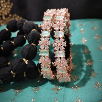 B0264_Lovely Rose Gold flower design American Diamond bangles with a touch of dazzling ocean green stones.