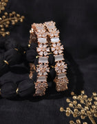 B0259__Elegant designer bangles with delicate designs studded with american diamond stones with a touch of ash color stones.