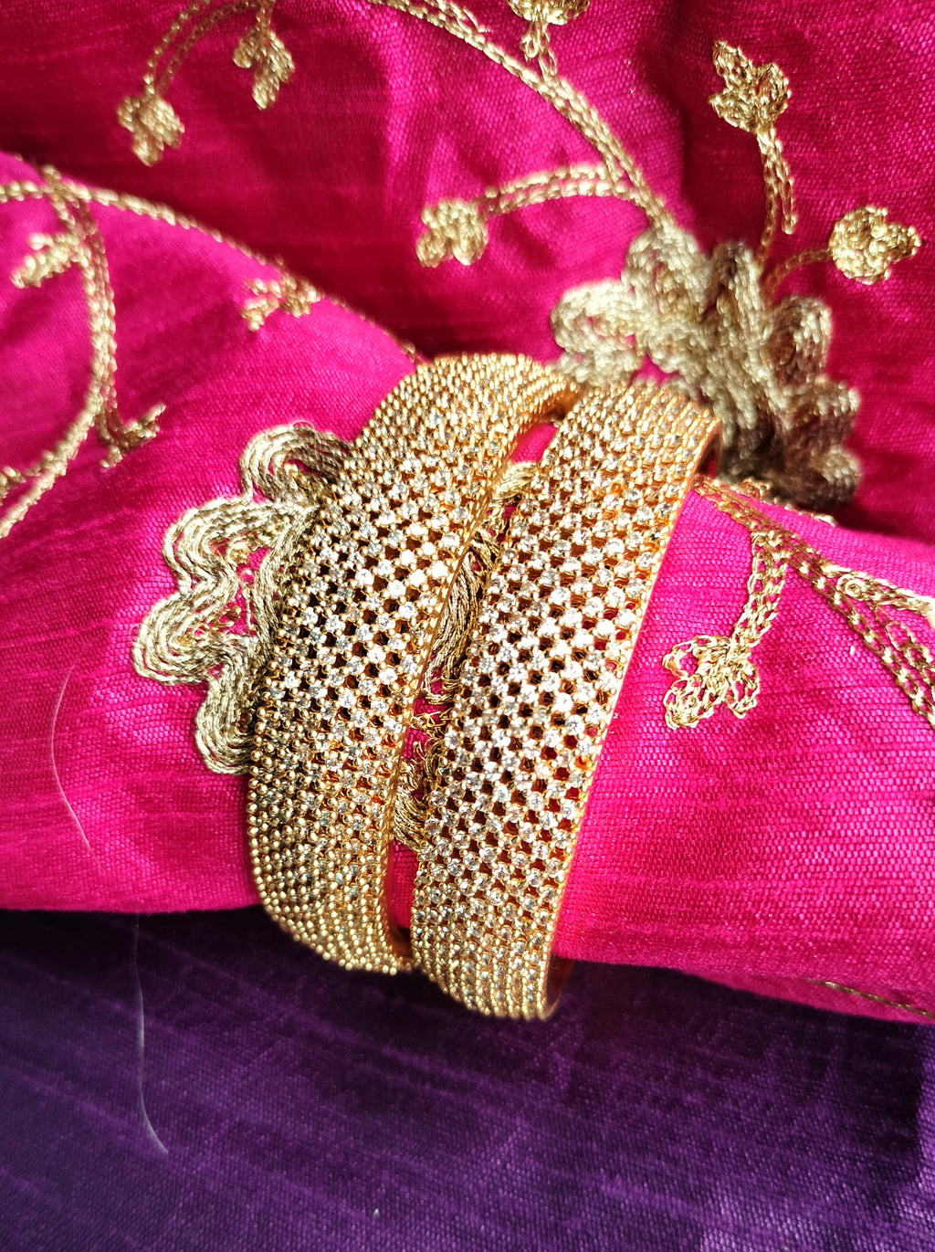 B0270_Classy broad Gold plated bangles studded with  delicate American Diamond  stones.