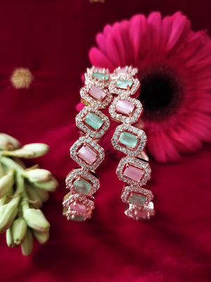 B0290_Elegant designer Bangles studded with American Diamond stones with a touch of mint green & pink stones with delicate stone work.