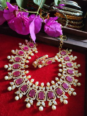 N0517_Lovely traditional style American Diamond necklace set with delicate stone work  with a touch of  red ruby stones along with pearl drops.