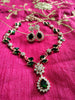 N0537_Elegant sleek design choker necklace embellished with american diamond stones with a touch of green stones.