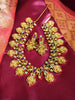 N0555_Traditional temple jewelry style Lakshmi design gold plated necklace set embellished with ruby stones .