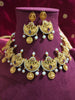 N0556_Classic temple jewelry style Lakshmi design gold plated necklace set embellished with ruby stones with a touch of pearls.