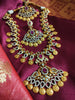 N0553_Grand temple jewelry style Lakshmi design gold plated necklace set embellished with ruby stones .