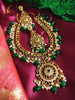 N0551_Grand designer gold plated necklace set embellished with ruby stones with green  bead drops.