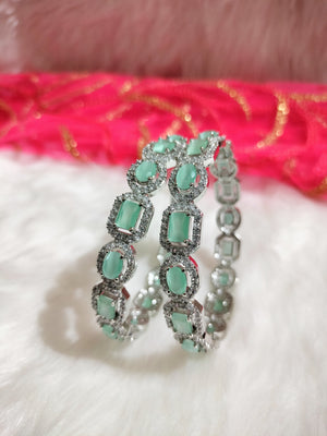 B0315_Elegant silver shade designer American Diamond bangles with a touch of sea green stones.