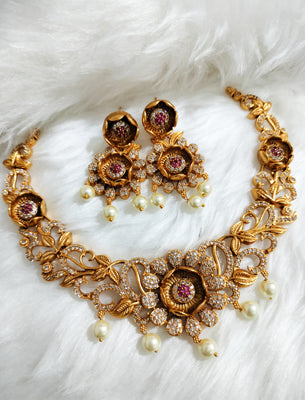 N0466_Gorgeous flower design gold plated American Diamond stones embellished Choker necklace set with delicate stone work with a touch of pink ruby stones with pearl drops.