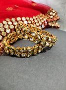 B0283_Classy Ethnic screw design bangles with delicate work of kundan stones.