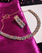 N0556_Elegant dazzling American Diamond stones studded dual tone choker set with delicate stone work .