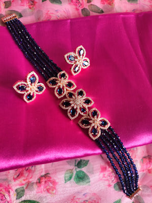 N0569_Classy navy blue crystal flower design choker necklace set studded with American diamond stones.