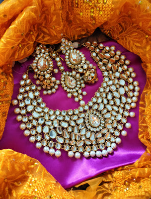 N0584_Royal Bridal style Elaborated choker necklace set studded with Kundan stones with a touch of glossy pearls.