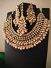 N0588_Royal Bridal style Elaborated choker necklace set studded with Kundan stones with a touch of glossy pearls.