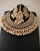 N0588_Royal Bridal style Elaborated choker necklace set studded with Kundan stones with a touch of glossy pearls.