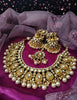 N0591_Royal Bridal style Elaborated choker necklace set studded with Kundan stones with a touch of glossy pearls.