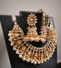 N0591_Royal Bridal style Elaborated choker necklace set studded with Kundan stones with a touch of glossy pearls.