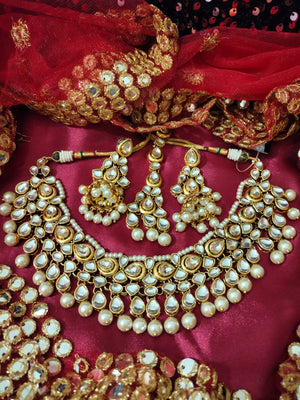 N0592_Royal designer choker necklace set studded with Kundan stones with a touch of glossy pearls.