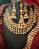 N0592_Royal designer choker necklace set studded with Kundan stones with a touch of glossy pearls.