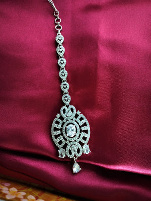 M037_Elegant designer American diamond studded Maang tika with delicate stone work.