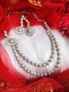 N0377_Gorgeous floral design American Diamond studded side pendant necklace set.