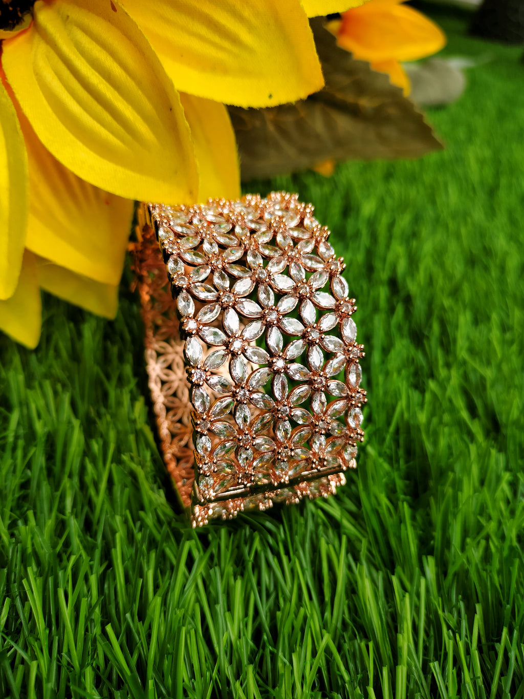 B0352_S_ Exquisite Rose Gold plated openable kada bangle with delicate art work studded with  American Diamond stones.