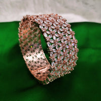 B0352_S_ Exquisite Rose Gold plated openable kada bangle with delicate art work studded with  American Diamond stones.