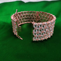 B0352_S_ Exquisite Rose Gold plated openable kada bangle with delicate art work studded with  American Diamond stones.