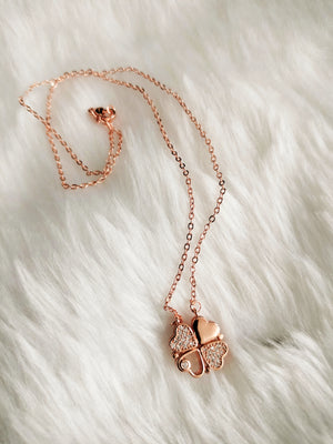 N01204_ Magnetic elegant design Rose gold Polished American Diamond pendant necklace studded with beautiful dazzling stones .