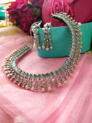 N01148_Grand Lovely designer Silver polished choker necklace embellished with American diamond stones with delicate mint green and pearl work.