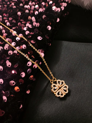 N01255_ Magnetic elegant design  gold Polished American Diamond pendant necklace studded with beautiful dazzling stones .