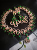 N01250_Gorgeous  designer rose gold american diamond embellished necklace set with a touch of  leafy green stones.