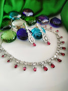 N03001_Classic silver polished choker style crafted design necklace set embellished with  red stones .