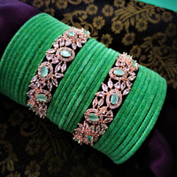 B02004_Elegant flowery design Bangles studded with American Diamond stones with a touch of mint green stones with delicate stone work. Also 2 Dozens of mint green velvet bangles