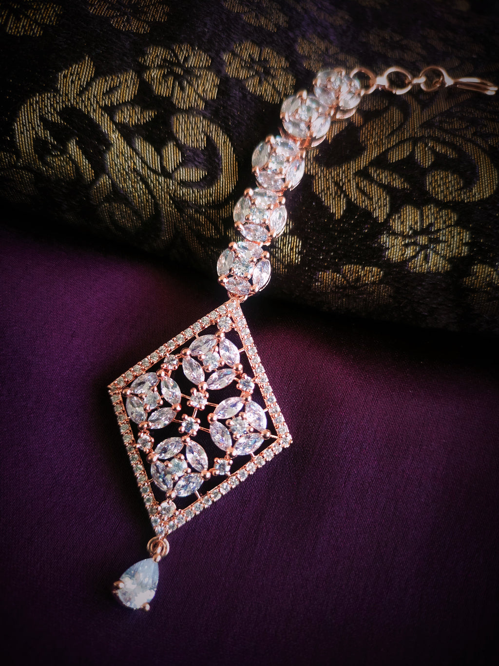 M055_Lovely designer  American diamond studded rose gold polished Maang tika with a touch of white stones.