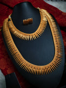 N03079_Grand Choker classic matte gold polished temple jewelry style crafted design gold plated necklace set embellished with ruby and green stones .