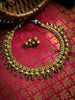 N03016_Classic matte gold polished temple jewelry style crafted design gold plated necklace set embellished with ruby and green stones .