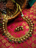 N03016_Classic matte gold polished temple jewelry style crafted design gold plated necklace set embellished with ruby and green stones .