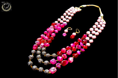 N062_Classy pink colored pebble work Layered Necklace embellished with pearls and studded with  semi precious stones.