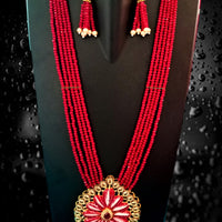 N0121_Classy Grand Crystal necklace set with a grand pendant  studded with stones and with delicate craft work.